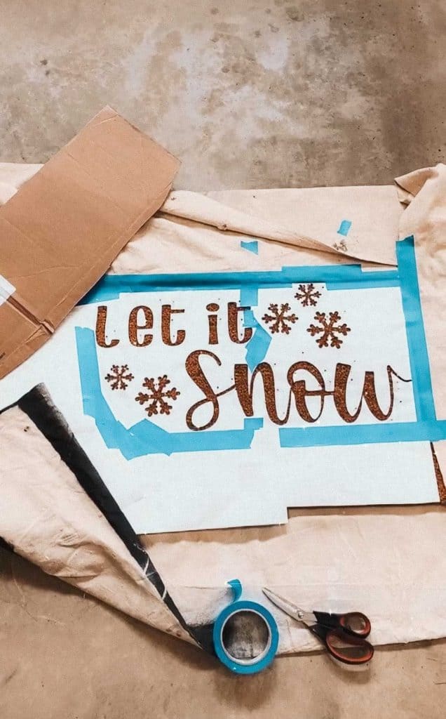 doormat with cricut stencil on top